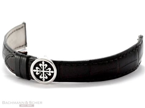 patek philippe symbol|patek philippe cross.